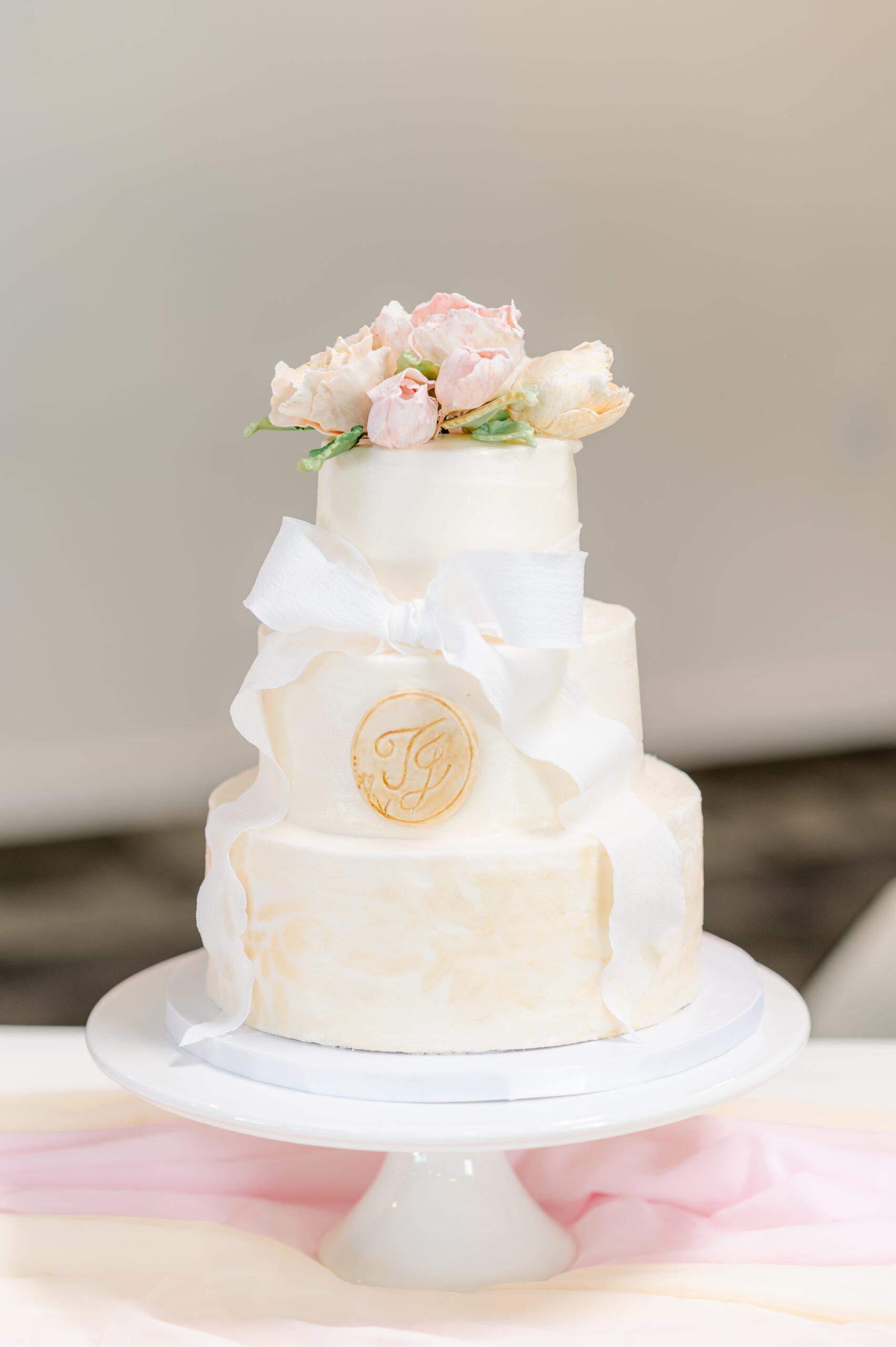 Weddings 3 Wedding cake with sugar flowers and monogram