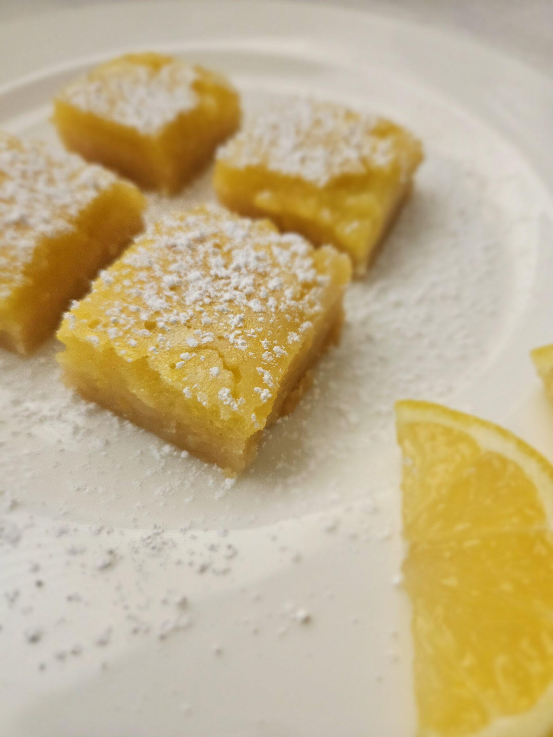 20250219_125509 Lemon bars dusted with powdered sugar
