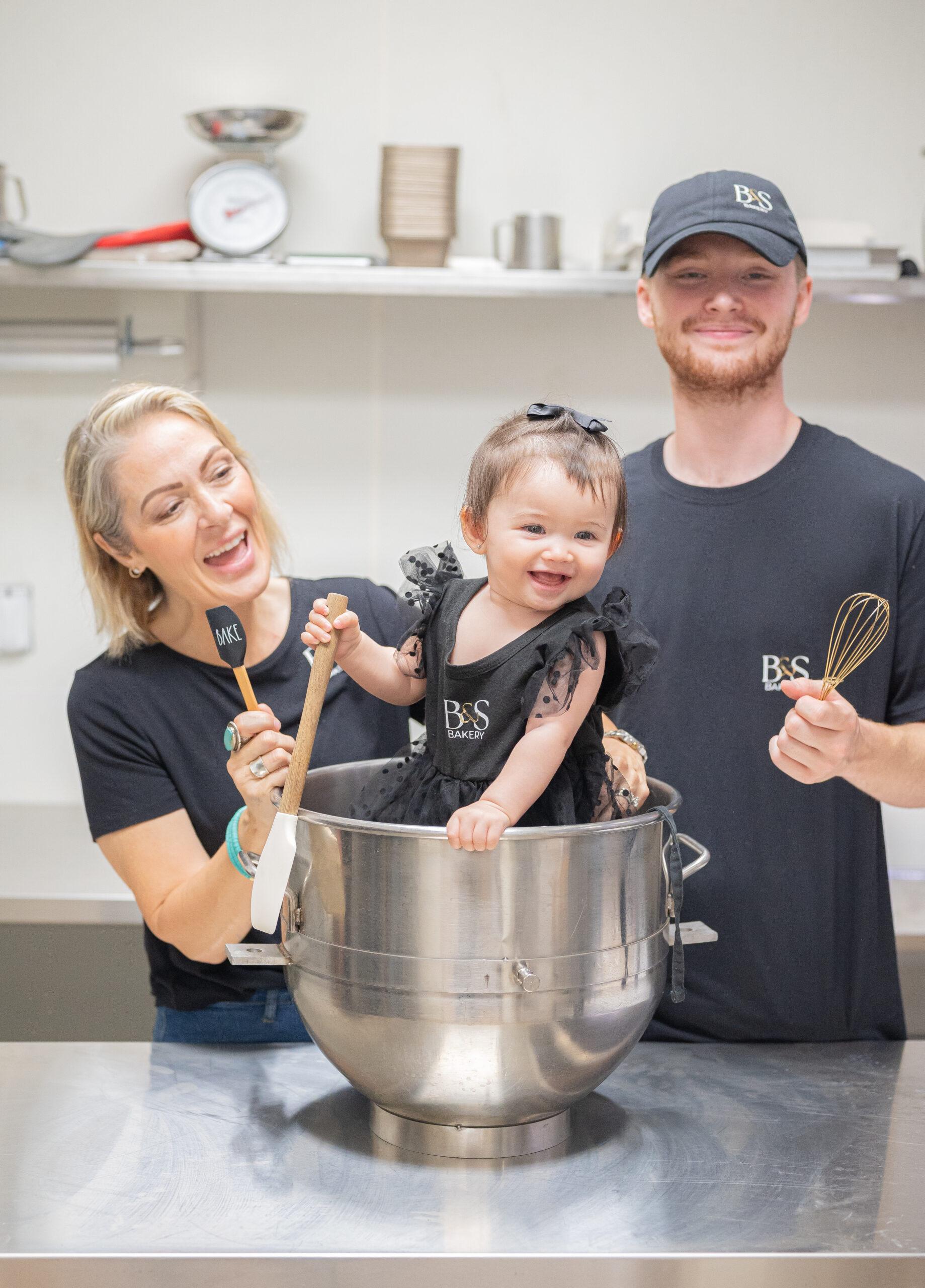 Family cooking together in kitchen.